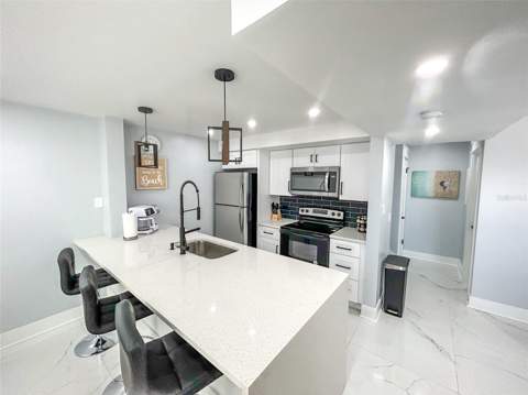 315 Medallion Boulevard #F, Madeira Beach FL - photo 8 of 25