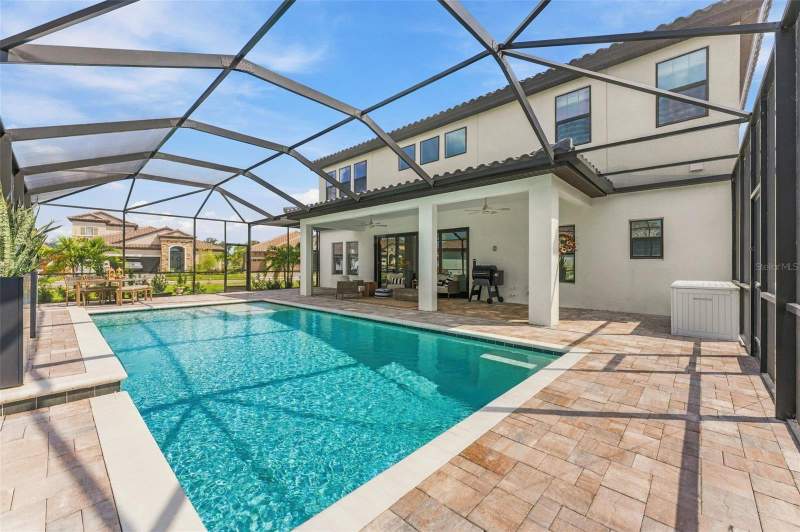 5 bedroom Single Family Residence at 14985 Rider Pass Drive, Hinton Hawkstone Ph 2B1, Lithia — photo 2