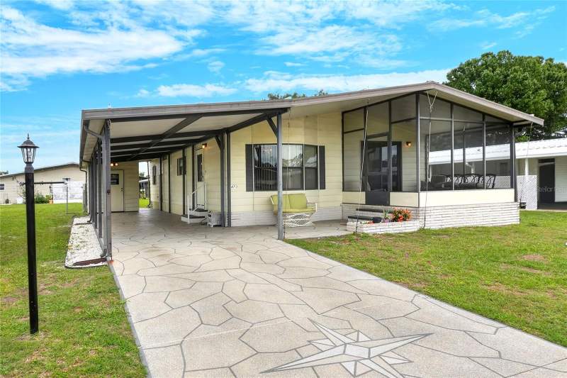 2 bedroom Manufactured Home at 6473 PEPPERTREE PATH, BROOKHAVEN VILLAGE FIRST ADD, WINTER HAVEN — photo 1