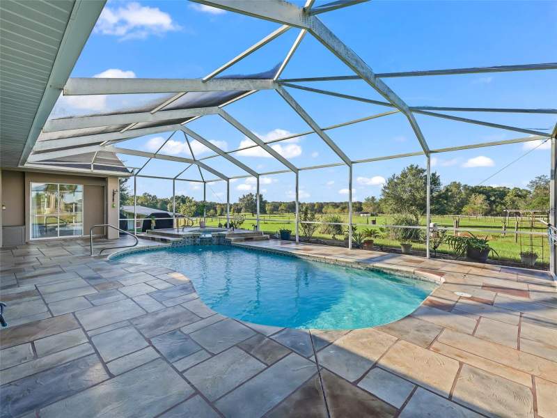 4 bedroom Single Family Residence at 9926 SE Sunset Harbor Road, Summerfield, Summerfield — photo 2