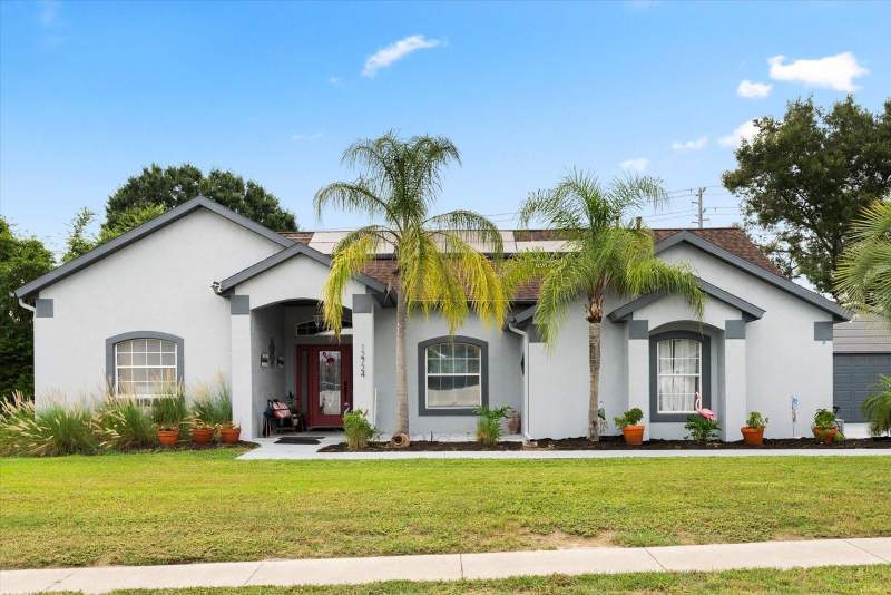 4 bedroom Single Family Residence at 12724 SCOTTISH PINE LANE, GREATER PINES PH 03, CLERMONT — photo 1
