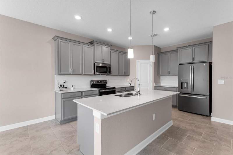 4 bedroom Single Family Residence at 8833 Beth Page Ln, Stoneybrook South North Prcl Ph 1, Davenport — photo 4