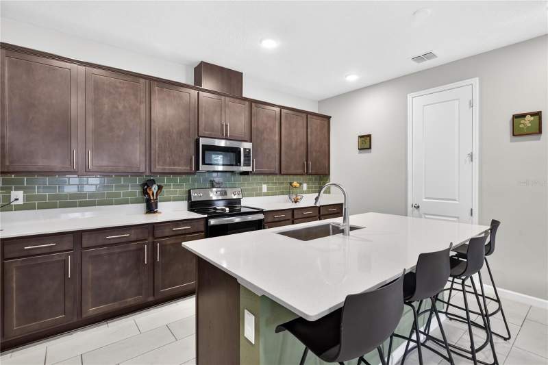 4 bedroom Single Family Residence at 3625 Sublett Loop, Seasons/The Grove A Re, Tavares — photo 4