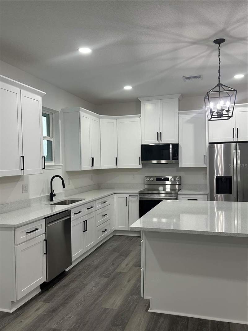 4 bedroom Single Family Residence at 13311 MIDWAY AVENUE, ASTATULA MONROE PARK, ASTATULA — photo 4
