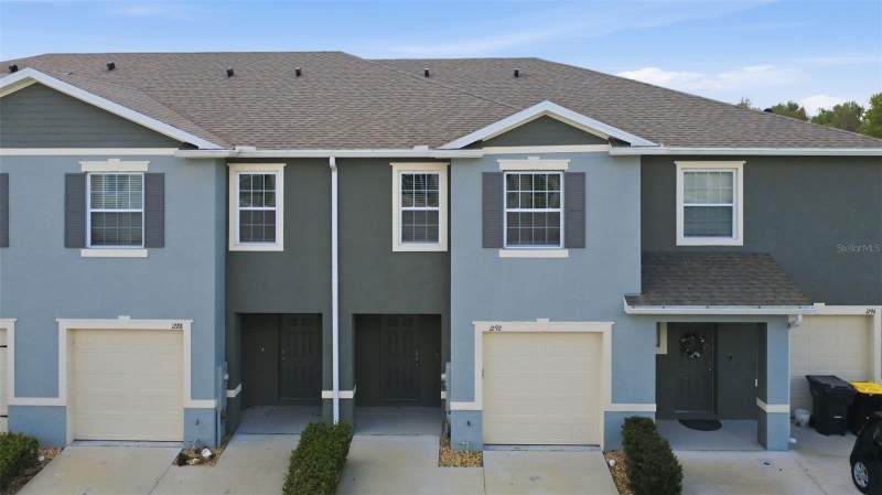 3 bedroom Townhouse at 1292 YELLOW FINCH DRIVE, ATRIA/RIDGEWOOD LAKES, DAVENPORT — photo 1