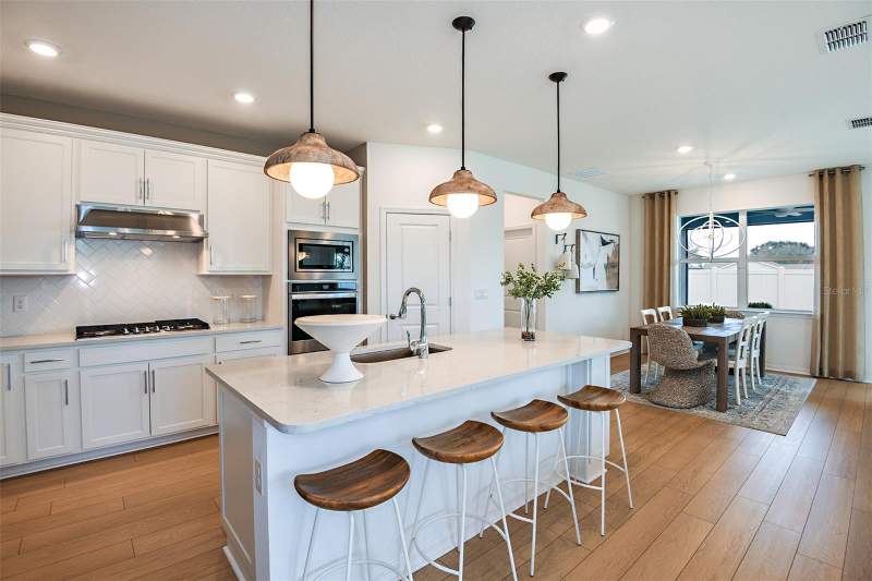 3 bedroom Single Family Residence at 9399 Wildlight Trail, Highfield At Twisted Oaks Ph 3, Wildwood — photo 5