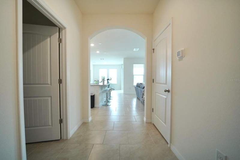 4 bedroom Single Family Residence at 6946 Audobon Osprey Cove, Villages At Harmony Ph 2A, Harmony — photo 5