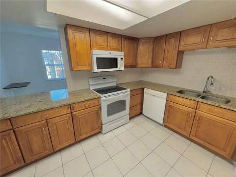 9909 Sweepstakes Lane #4, Orlando FL - photo 8 of 27