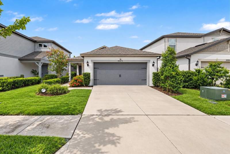 4 bedroom Single Family Residence at 20873 Drake Elm Dr, Whispering Pines, Land O Lakes — photo 1