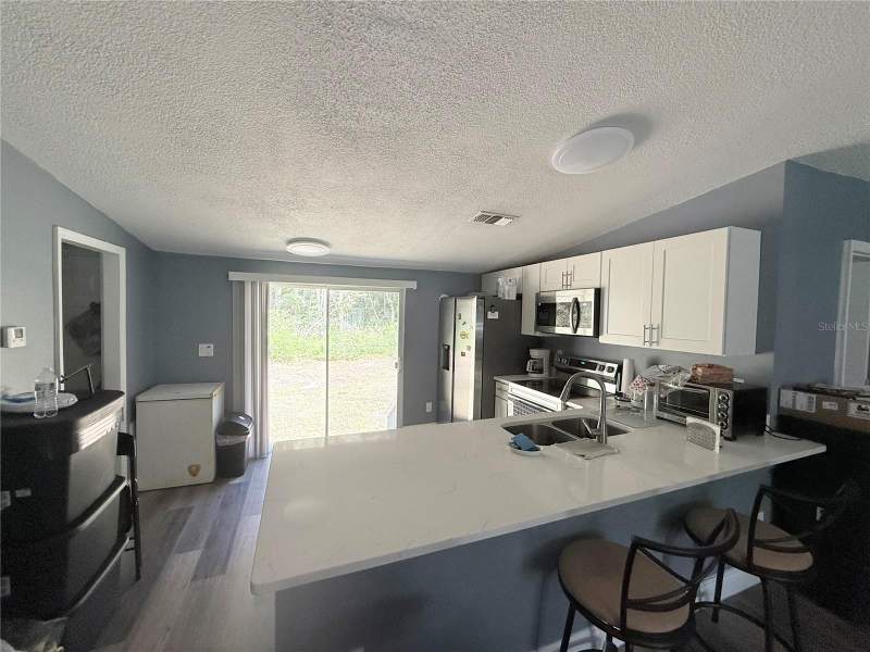 3 bedroom Manufactured Home at 12051 NW 7th Place, Meadow Wood Acres, Ocala — photo 5