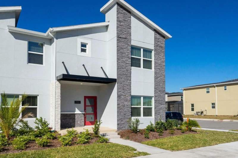 5 bedroom Townhouse at 2994 PROTAGONIST STREET, COVE AT STOREY LAKE 4, KISSIMMEE — photo 1