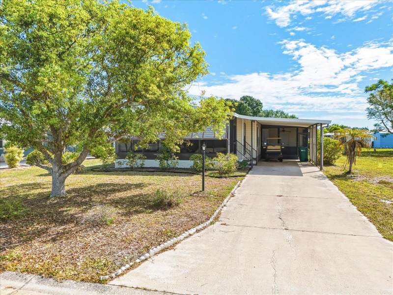 6144 REDWING AVENUE home for sale in Lemon Bay Isles