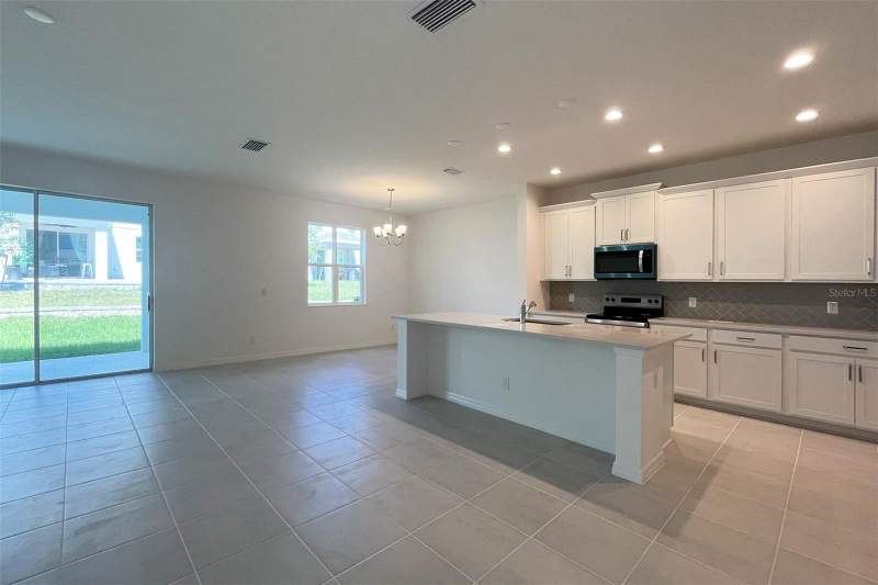 4 bedroom Single Family Residence at 7052 Rolling Leaf Road, Trinity Lakes Phase 4, Groveland — photo 4