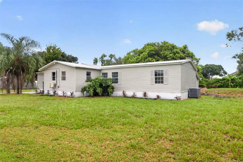 4 bedroom Manufactured Home at 10213 UNION PARK DRIVE, METES AND BOUNDS, ORLANDO — photo 1