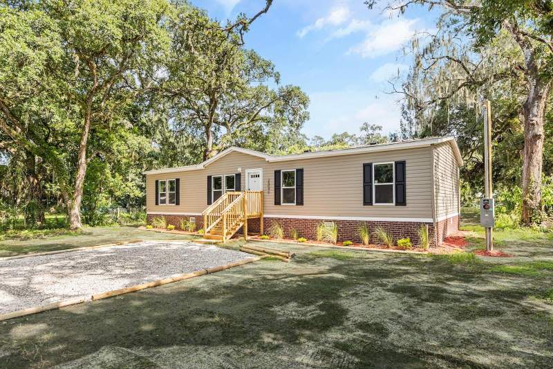 4 bedroom Manufactured Home at 25046 CELESTIAL STREET, CHRISTMAS PARK FIRST ADD, CHRISTMAS — photo 3