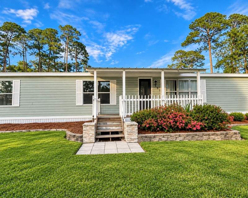 4 bedroom Manufactured Home at 8809 Treasure Island Road, Leesburg, Leesburg — photo 2