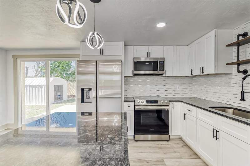3 bedroom Single Family Residence at 1300 Melonwood Avenue, Woodvalley Unit 5, Clearwater — photo 4