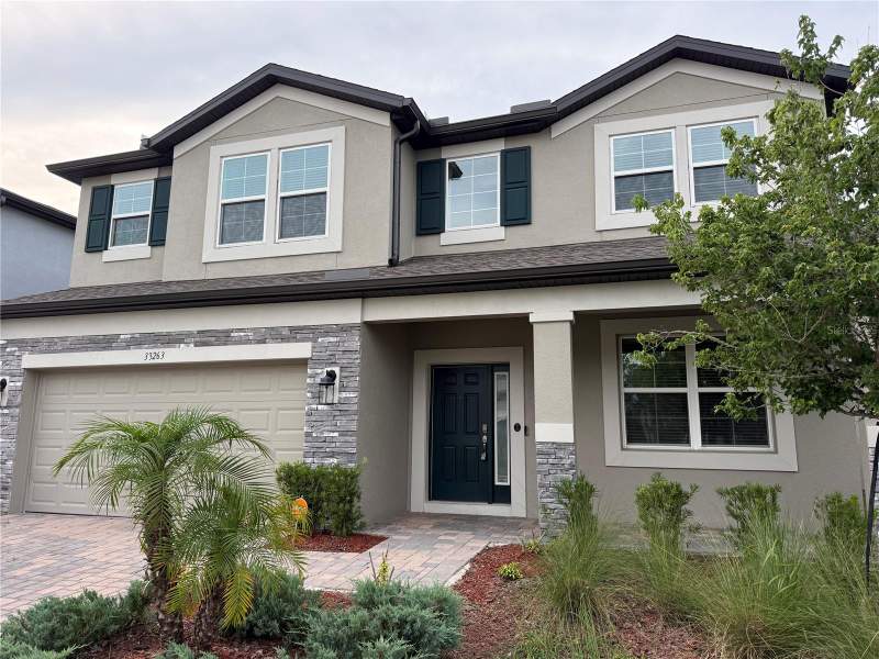 5 bedroom Single Family Residence at 33263 Sycamore Leaf Drive, Whispering Oaks Preserve Ph 1, Wesley Chapel — photo 2
