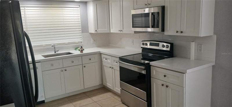 4 bedroom Single Family Residence at 1019 Peninsula Road, Gulfview Ridge, Tarpon Springs — photo 4