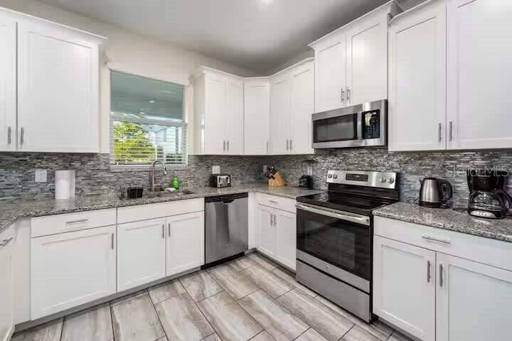 6 bedroom Single Family Residence at 9045 HAZARD STREET, STONEYBROOK SOUTH PH I-1 & J-1, DAVENPORT — photo 5