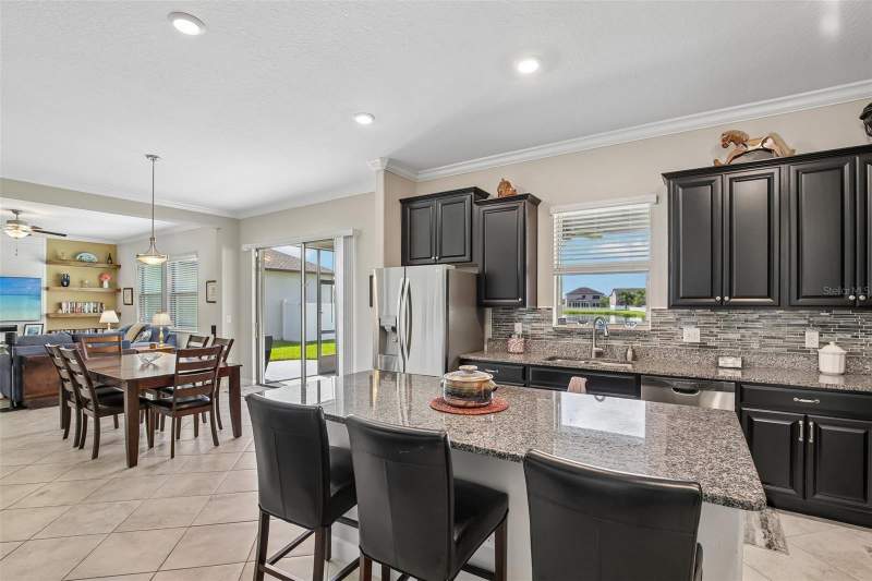 5 bedroom Single Family Residence at 11705 Navajo Sandstone Street, South Fork P Ph 2 & 3B, Riverview — photo 5