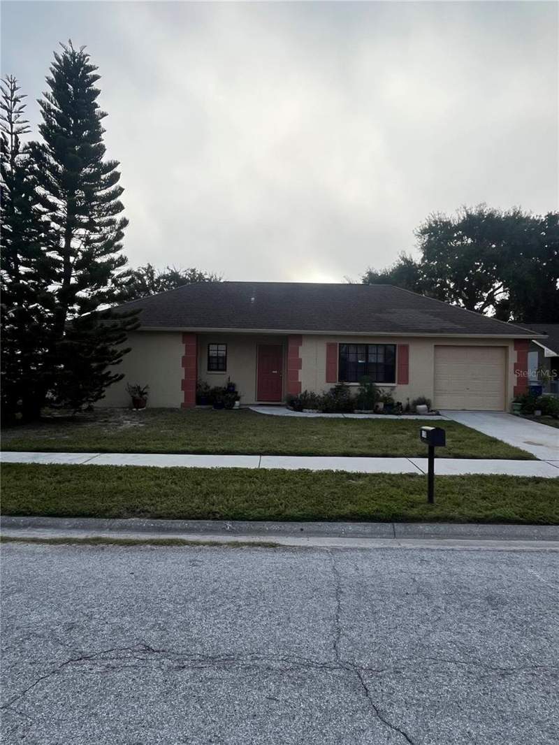 1238 FUCHSIA DRIVE home for sale in Holiday Lakes West