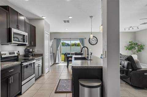 4714 Ron Eddie Place, Tampa FL - photo 11 of 58