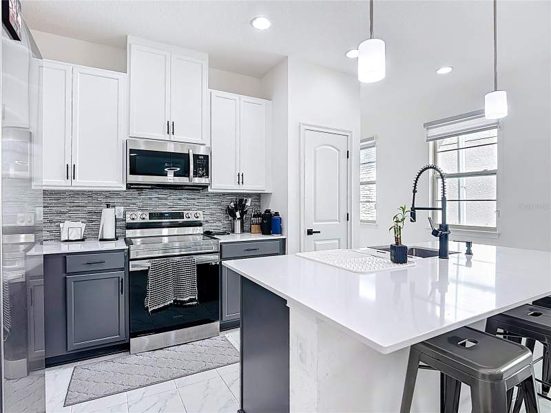 3 bedroom Single Family Residence at 7541 WING SPAN WAY, ENCLAVE AT LAKES OF HARMONY, HARMONY — photo 5