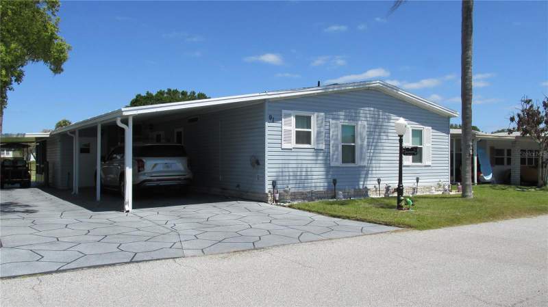 2 bedroom Manufactured Home at 91 STRAPHMORE DRIVE, SWEETWATER GOLF & TENNIS CLUB, HAINES CITY — photo 5