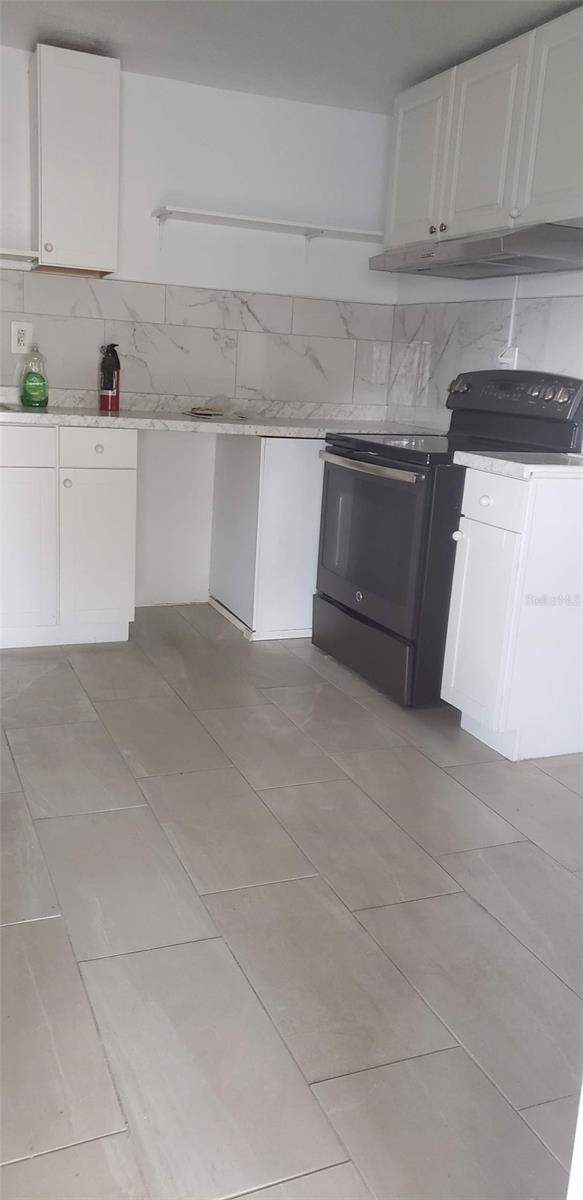 4 bedroom Single Family Residence at 1118 Harris Lane, Acre & Unrec Plat, Clearwater — photo 3