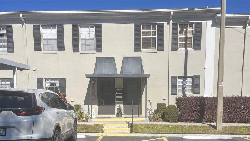 2 bedroom Condominium at 689 LAKE HOWARD DRIVE #1E, WELLINGTON PT 01 BLDGS 01 02 & WELLINGTON PT 02 B, WINTER HAVEN — photo 1