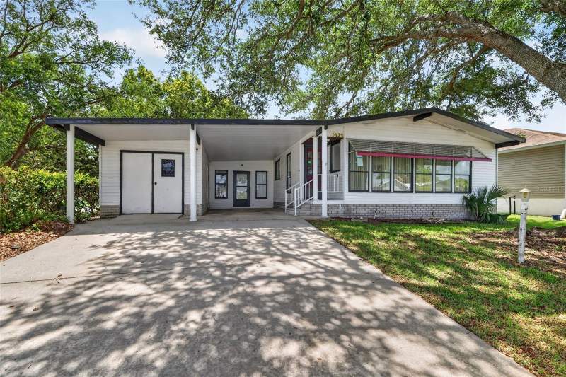 2 bedroom Manufactured Home at 1625 Hilton Head Boulevard, Lady Lake Orange Blossom Gardens Unit 09, Lady Lake — photo 2