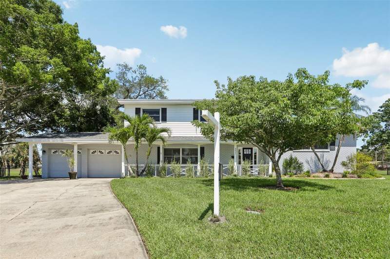 4 bedroom Single Family Residence at 6827 Tequesta Drive, Seminole Lake Golf &, Seminole — photo 4