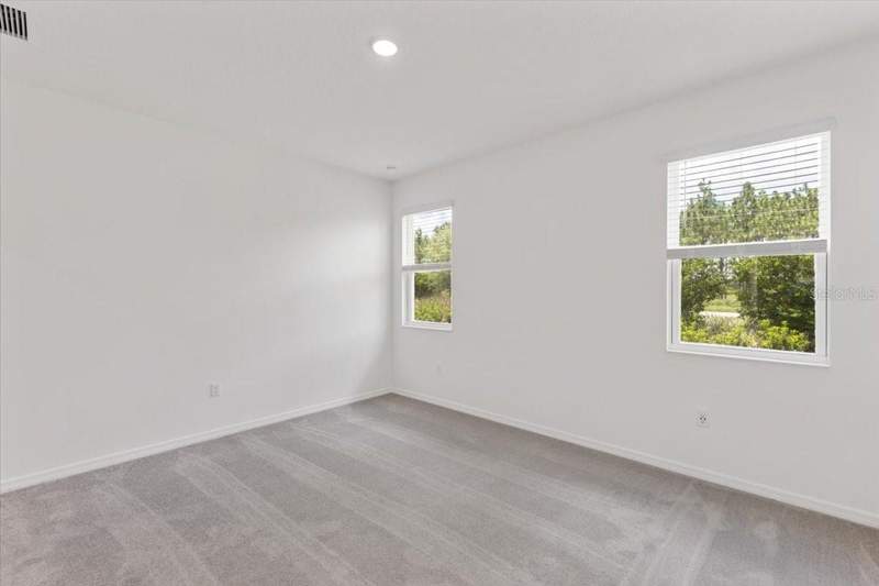 4 bedroom Single Family Residence at 9124 Wildlight Trail, Highfield At Twisted Oaks, Wildwood — photo 2