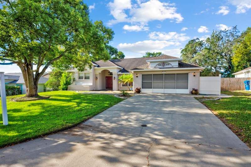 4 bedroom Single Family Residence at 8088 Spanish Oak Drive, Berkeley Manor Ph I, Spring Hill — photo 2