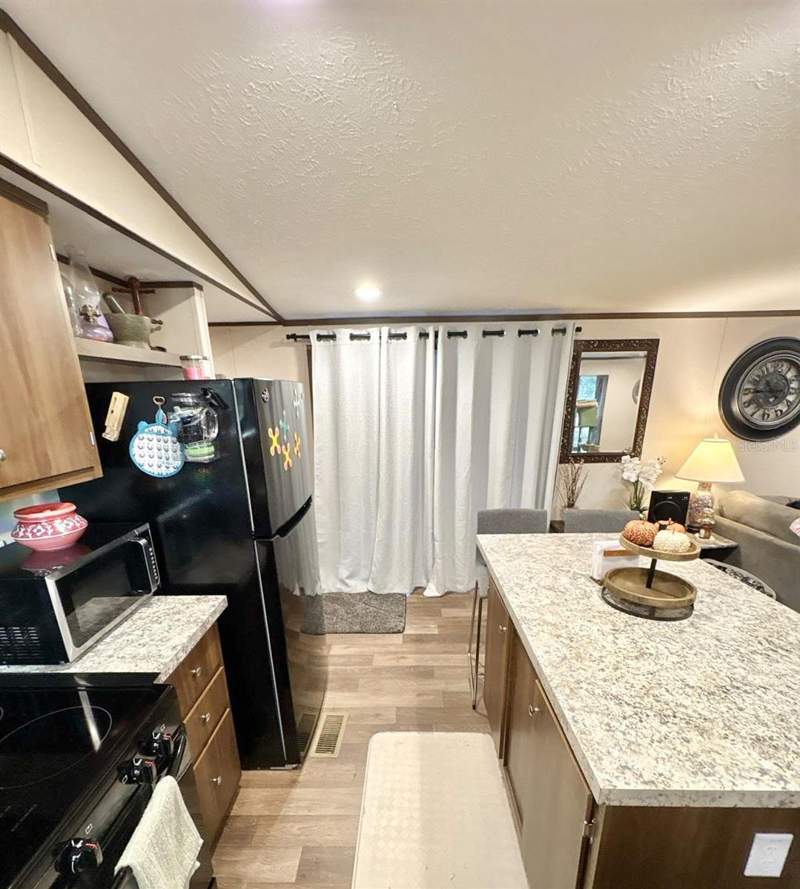 4 bedroom Manufactured Home at 10760 NE 114th Street, University Oaks, Archer — photo 3