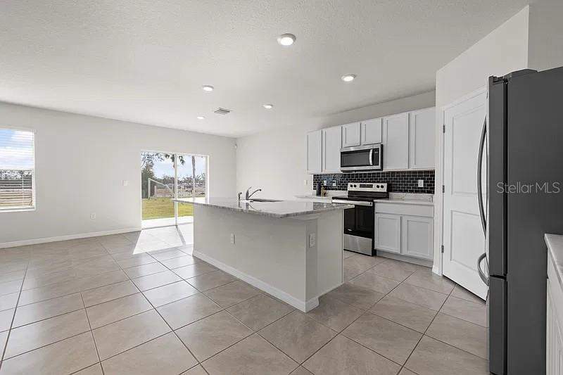 5 bedroom Single Family Residence at 17249 Wheatberry Boulevard, Rye Crossing, Parrish — photo 5