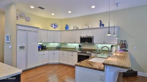 2672 E Spruce Creek Boulevard, Port Orange FL - photo 10 of 45
