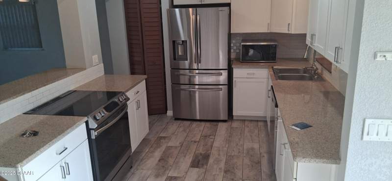 4 bedroom Single Family Residence at 653 Sweetwood Drive, Sweetwater Hills, Port Orange — photo 5