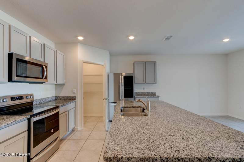 4 bedroom Single Family Residence at 1197 August Sky Drive, Deltona, Deltona — photo 2