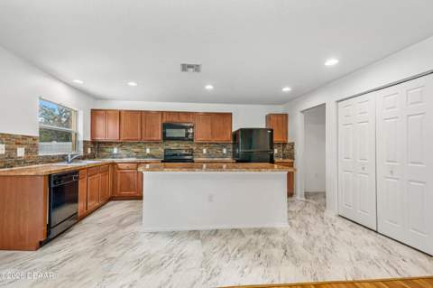 313 Bayberry Lakes Boulevard, Daytona Beach FL - photo 13 of 52