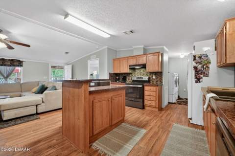 163 West Street, Oak Hill FL - photo 12 of 29