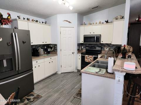 1976 Myrtle Jo Drive, Ormond Beach FL - photo 12 of 52