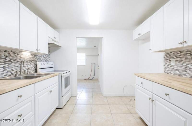 4 bedroom Single Family Residence at 416 S Caroline Street, Daytona Gardens, Daytona Beach — photo 5