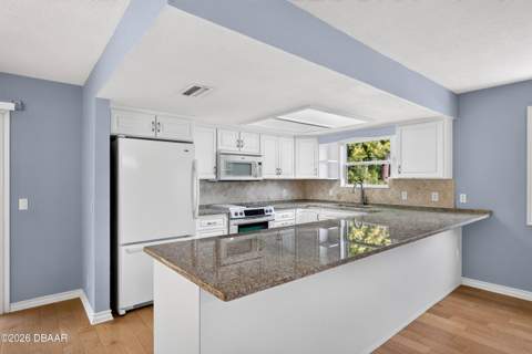51 Sandpiper Circle, Ormond Beach FL - photo 13 of 64