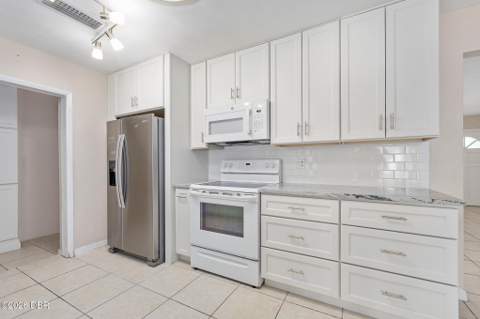 22 Plaza Drive, Ormond Beach FL - photo 12 of 53