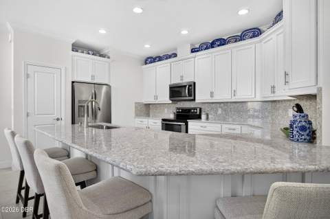 842 Margaritaville Avenue, Daytona Beach FL - photo 6 of 34
