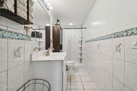 208 S Gaines Street, Oak Hill FL - photo 10 of 24