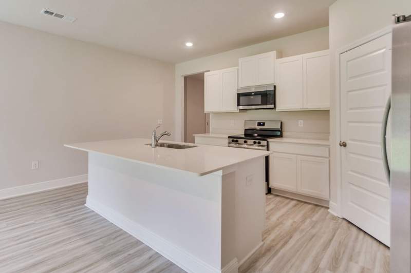 4 bedroom Detached Single Family at 3025 Heritage Plantation Boulevard, Heritage Plantation Phase 2, Laurel Hill — photo 3