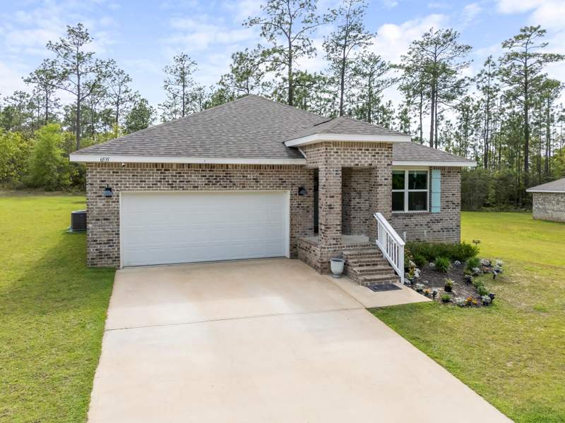 4 bedroom Detached Single Family at 6535 Torrey Pines Trace, Heritage Plantation, Laurel Hill — photo 2